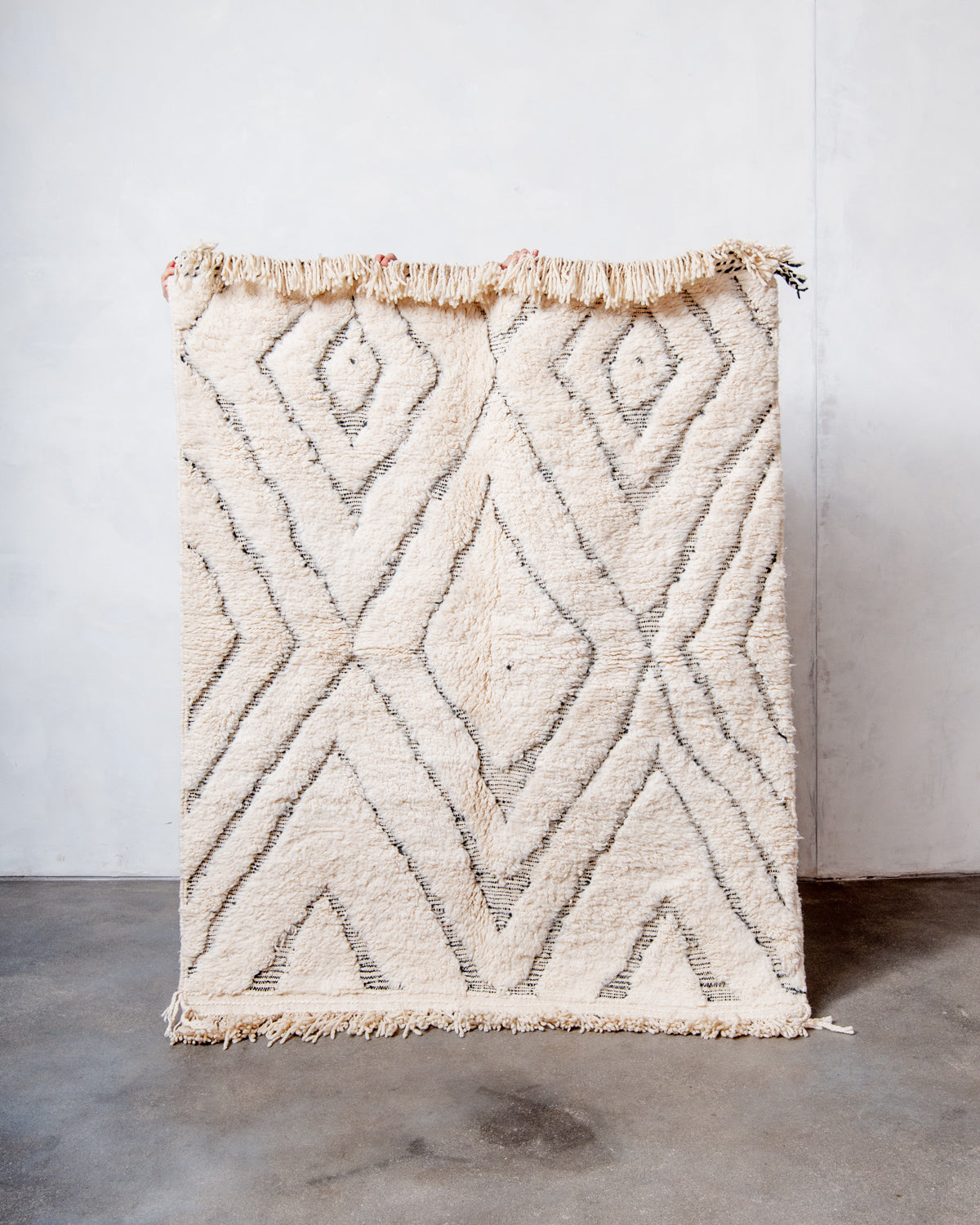 Modern, designer, handcrafted Berber rug from Morocco. Beniourain carpet with beautiful colours and patterns and fluffy wool texture.